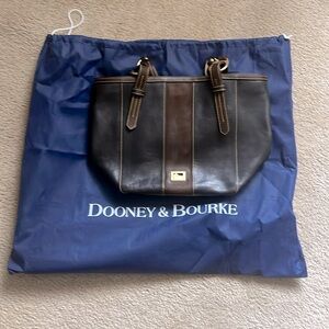 Dooney medium tote: Black leather with brown suede accent and gold hardware.